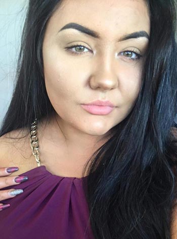 LOL!  Using fake tanning cream, this beautiful woman's skin turns green like a woman's Buto Ijo